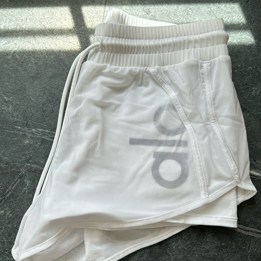 Alo Ambience short, white, mesh overlay with spandex underneath, size S